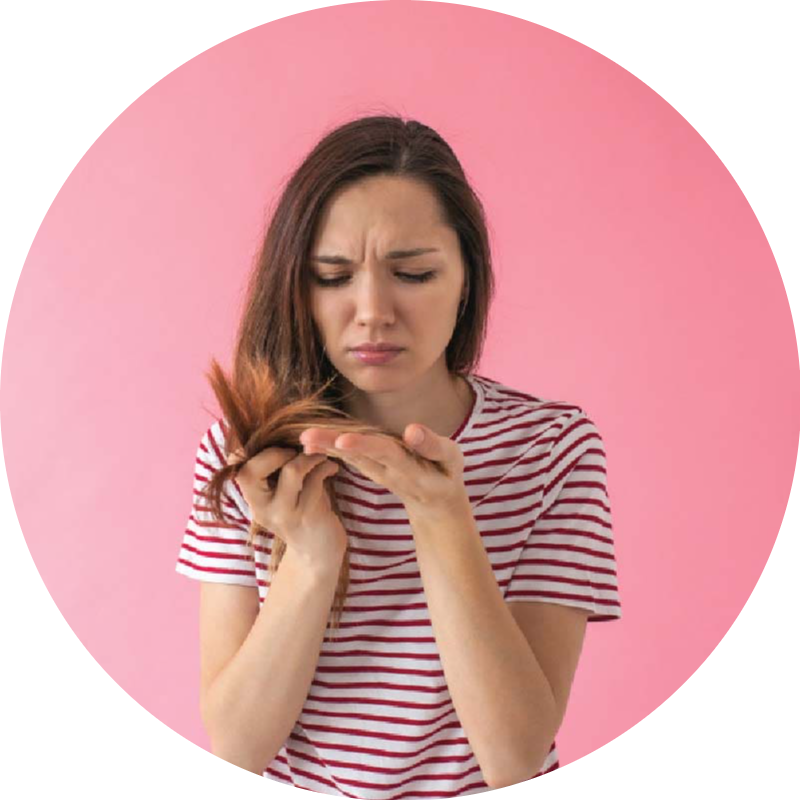 A woman distressed by excessive hair breakage and hair loss, a common problem that QR678® Neo effectively treats in Canada.